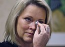 Former Boston television news anchor Heather Unruh holds back tears while speaking Wednesday, Nov. 8, 2017, in Boston, about the alleged sexual assault of her teenage son by actor Kevin Spacey in the summer of 2016 on Nantucket. ( (ANSA)