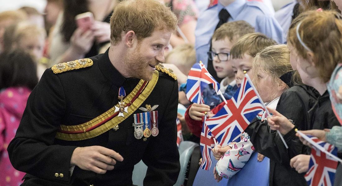 Prince Harry presents RAF Regiment with a new Queen's Colour © EPA