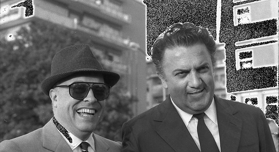 Il produttore Carlo Ponti (S) e il regista Federico Fellini sul set di Le tentazioni del dottor Antonio, uno dei quattro episodi del film Boccaccio '70, girato all'Eur - Roma, 1961. ANSA © ANSA/OLDPIX