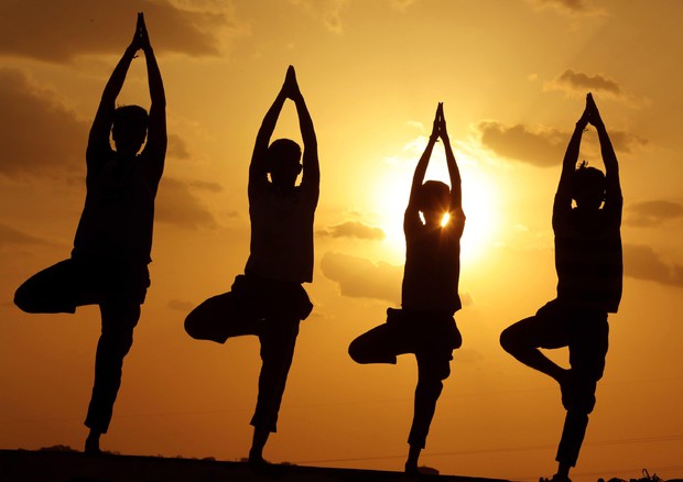 Un momento di preparazione per il World Yoga Day in Bhopal © EPA