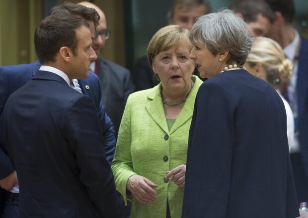 Emmanuel Macron, Angela Merkel e Theresa May © EPA