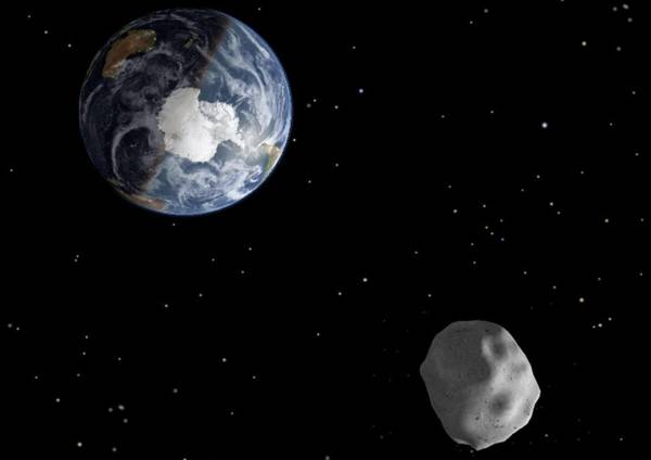L'asteroide 2012 DA14 e la Terra (modello)