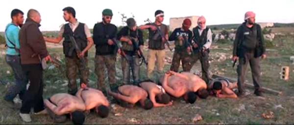 Foto esecuzione lealisti da parte ribelli