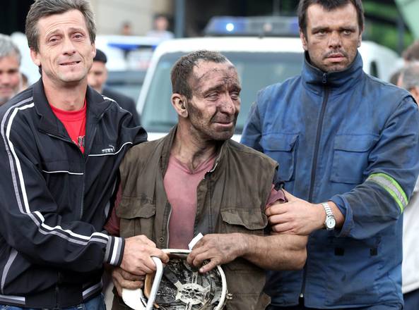 Rescuers work to free workers trapped in Bosnian mine
