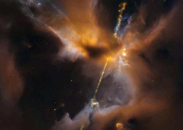 Il duello stellare fotografato dal telescopio spaziale Hubble (fonte: ESA/Hubble & NASA, D. Padgett, GSFC; T. Megeath, University of Toledo; B. Reipurth, University of Hawaii)