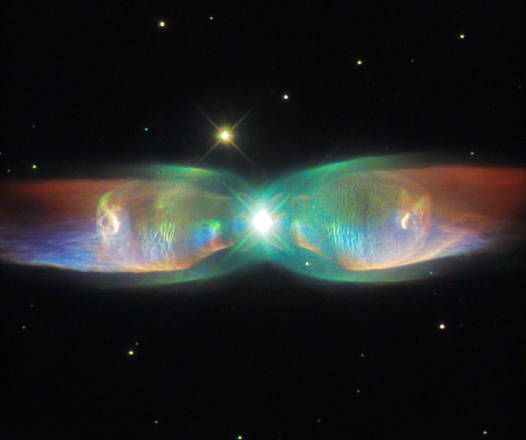 Farfalla cosmica immortalata dal telescopio Hubble (fonte: ESA/Hubble & NASA. Judy Schmidt) 