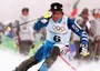 Alberto Tomba, vincitore di due medaglie d'oro a Calgary '88 e di una a Albertville nei Giochi Invernali del '92, impegnato nello slalom speciale a Nagano 1998