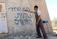 'Sange e vendetta' , la scritta su un muro di Hebron © Ansa