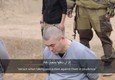Video propaganda Isis, bimbo spara a prigionieri © ANSA