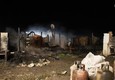Incendio nel Gran Ghetto di Rignano, 2 immigrati morti © ANSA