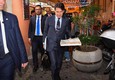 Italian Premier designate Giuseppe Conte takes a pizza © 