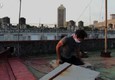Coronavirus, a Cuba atleti e artisti si allenano sui tetti © ANSA