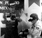 Un'immagine d'archivio, datata 28 maggio 1989, mostra Michele Alboreto (D) sul podio del Gran Premio  del Messico insieme con Ayrton Senna © ANSA