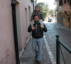 Giuseppe Di Caprio - A passeggio per il centro di Treviso. Festa del Papà ma anche di Massimiliano che il 23.03 compie tre anni. © ANSA