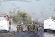 Cile, scarseggiano cibo e lavoro a causa del lockdown: scontri a Santiago