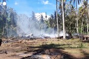 Filippine, i resti dell'aereo precipitato, almeno 50 le vittime dello schianto