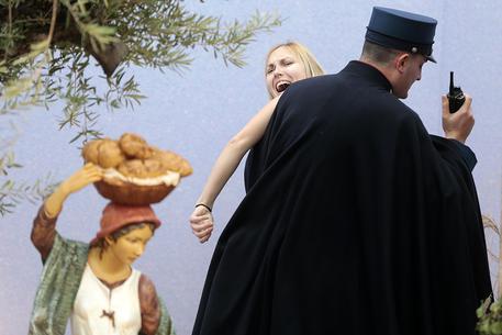 A Femen activist protests in Vatican © ANSA