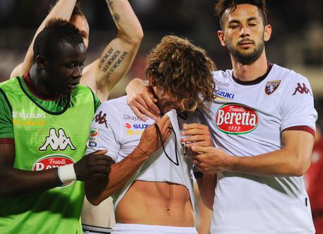 Alessio Cerci deluso dopo aver sbagliato il rigore contro la Fiorentina il 18 maggio al Franchi. Ma il Torino e' ugualmente in Europa League dopo l'esclusione del Parma © ANSA 