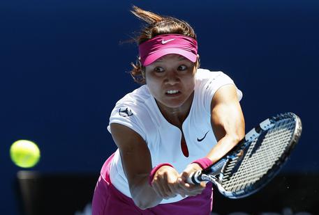 Li Na in azione contro Eugenie Bouchard nella semifinale degli Open d'Australia 2014 © ANSA