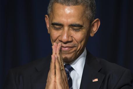 Obama davanti al Dalai Lama © AP