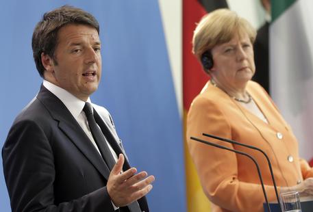 Matteo Renzi e Angela Merkel © AP