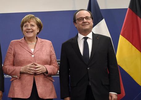 Angela Merkel e Francois Hollande © AP