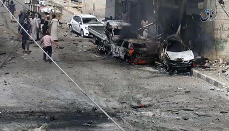 La citta' di Manbij, nella provincia di Aleppo, dopo un bombardamento © AP