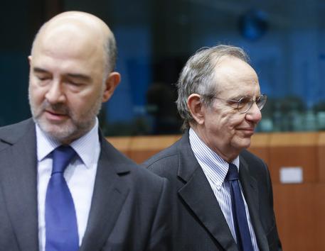 Il ministro Padoan e il commissario Moscovici, foto d'archivio © EPA