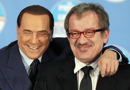 Silvio Berlusconi e Roberto Maroni in una foto del 18 febbraio 2013 © ANSA