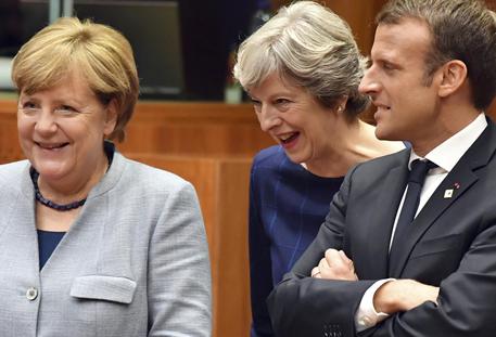 Angela Merkel, Theresa May e Emmanuel Macron © AP