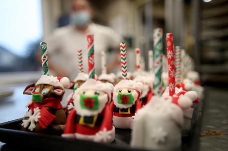 Christmas pastries with Corona Pandemic themed creations © EPA
