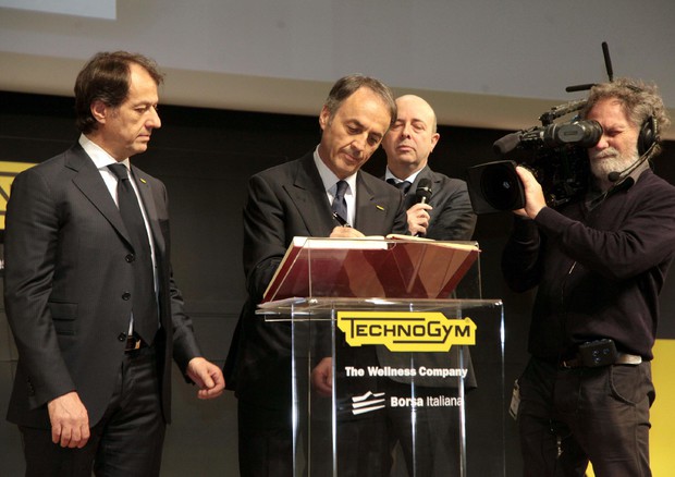 Da sinistra: Pierluigi Alessandri, Nerio Alessandri e Raffaele Jerusalmi durante il primo giorno di  quotazione in Borsa dI Technogym © ANSA