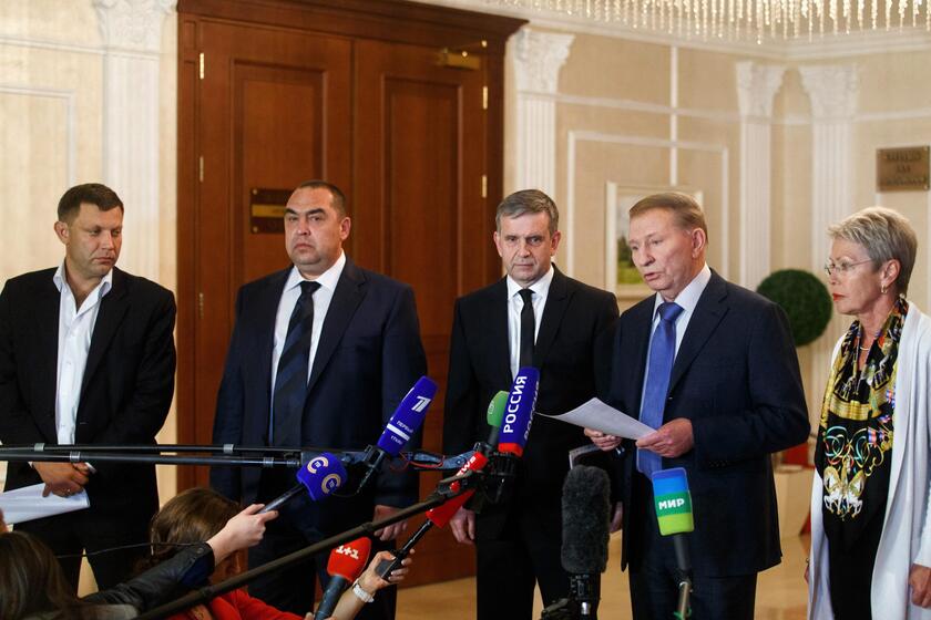 L 'annuncio dell 'accordo di Minsk, il 20 settembre 2014 © ANSA/EPA