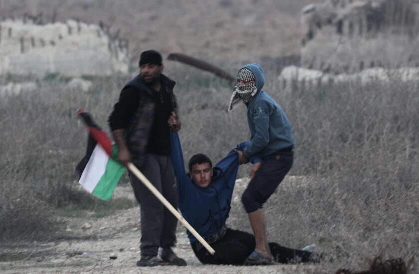 Clashes between protestors and IDF in Gaza City © ANSA/EPA