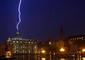 La foto simbolo del fulmine su San Pietro scattata nel giorno dell'annuncio delle dimissioni di Benedetto XVI © ANSA