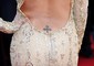 Cannes 2013. La croce celtica tatuata sul fondo schiena di Eva Longoria © Ansa