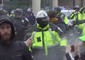 Lacrimogeni e spray irritanti sui manifestanti a Washington © ANSA