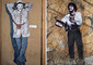 L'omaggio a Gigi Proietti della street artist Laika vicino al bar di Febbre da cavallo e il murale di Harry Greb al Tufello ANSA/RICCARDO ANTIMIANI © ANSA