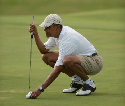 US President Barack Obama enjoys a round of golf