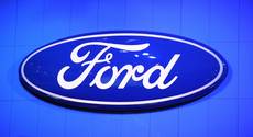 Ford: utile trimestre dimezzato