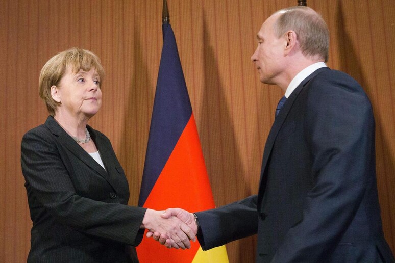 Prove di disgelo tra Merkel e Putin, in Normandia © ANSA/EPA