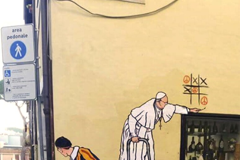 Um murale con Papa Francesco vicino al Vaticano - RIPRODUZIONE RISERVATA