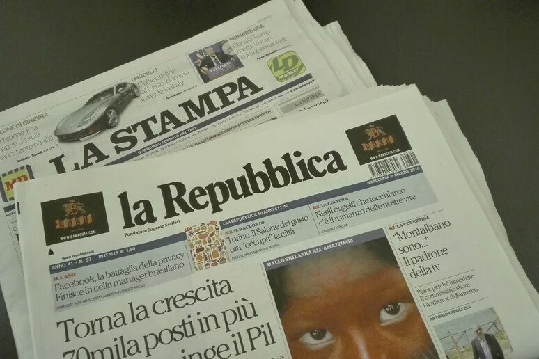 Merger between La Repubblica and La Stampa 's respective owners -     ALL RIGHTS RESERVED