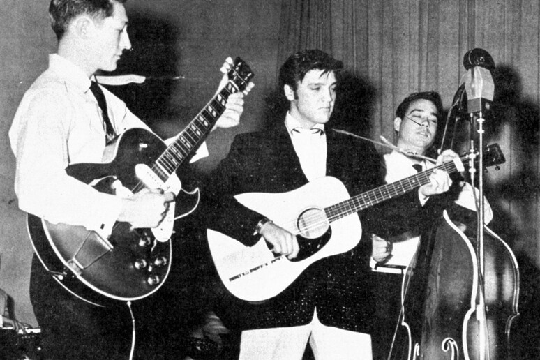 Elvis Presley, Scotty Moore, Bill Black © ANSA/AP