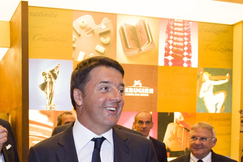 L 'allora premier Matteo Renzi in visita alla Perugina il 29 settembre 2016 - RIPRODUZIONE RISERVATA