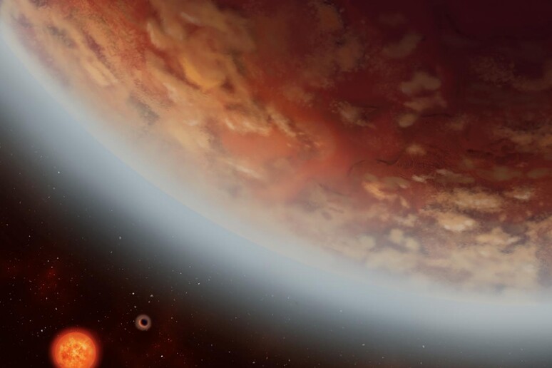 Il pianeta K2-18b e il suo vicino K2-18c orbitano intorno a una stella più piccola e fredda della nostra, una nana rossa (foto: Alex Boersm) - RIPRODUZIONE RISERVATA