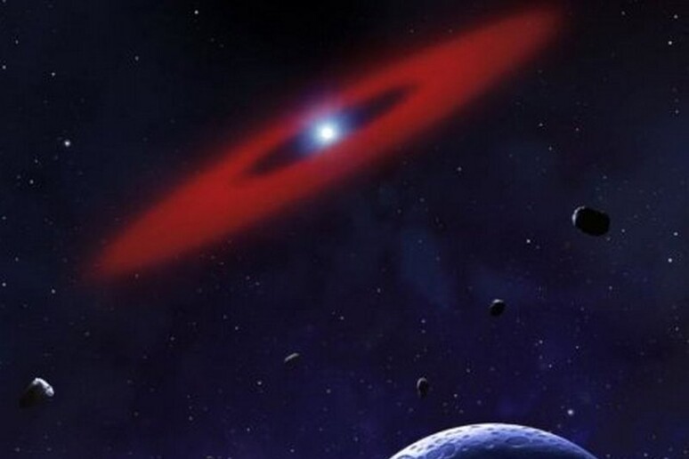 Rappresentazione artistica di un sistema planetario in orbita attorno a una nana bianca; l 'anello rappresenta asteroidi e pianetini già catturati dalla stella (fonte: University of Warwick) - RIPRODUZIONE RISERVATA