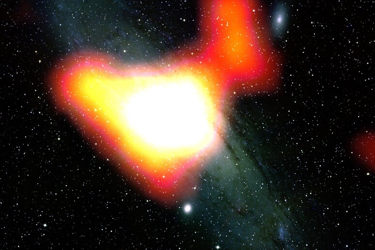 Rappresentazione artistica del lampo gamma generato dalla materia oscura nella galassia Andromeda (fonte: NASA/DOE/Fermi LAT Collaboration; Bill Schoening, Vanessa Harvey/REU program/NOAO/AURA/NSF) - RIPRODUZIONE RISERVATA