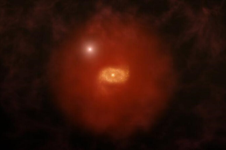 Rappresentazione artistica di una galassia dall 'aspetto simile a quello della Via Lattea quando era molto giovane e circondata da una brillante nube di idrogeno (fonte: A. Angelich (NRAO/AUI/NSF) - RIPRODUZIONE RISERVATA