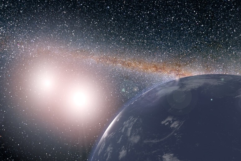 Rappresentazione artistica di un pianeta con due soli simile alla Terra (fonte: NASA/JPL-Caltech) - RIPRODUZIONE RISERVATA
